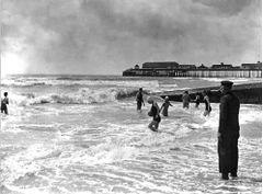 Lifeguard-keeping-a-watchful-eye-on-swimmers-in-rough-seas-Carlisle-Parade.-March-1934